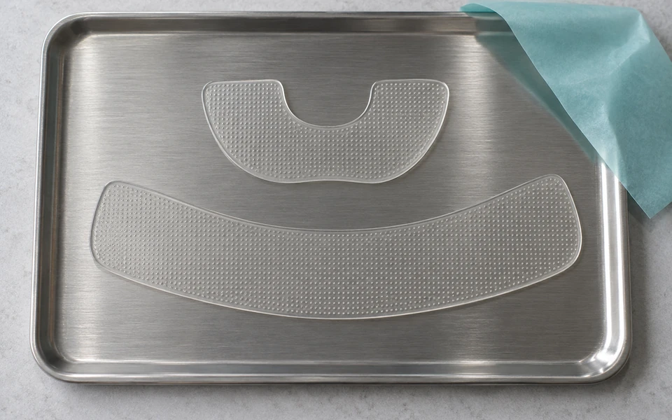 AI-generated illustrative product concept Lip-contour and neck-area cosmetic microneedle patch prototypes